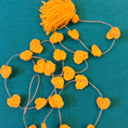 Load image into Gallery viewer, Yellow Heart Hand-knit Toran (set of 2) - Granmade