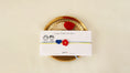 Load image into Gallery viewer, Crochet Heart and Flower Rakhi set of 2