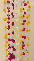 Load and play video in Gallery viewer, Red Daisy Hand-knit Toran (set of 2)