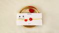 Load image into Gallery viewer, Crochet Heart and Flower Rakhi set of 2
